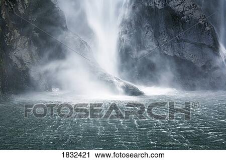 Waterfall, Milford Sound, New Zealand View Large Photo Image Stock Image - Waterfall, Milford Sound, New Zealand. Fotosearch