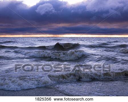 Stock Photograph - Waves along the shore. Fotosearch