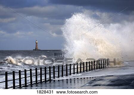 Waves crashing at lighthouse, Sunderland, Tyne and Wear, England View Large Photo Image Stock Image - Waves crashing at lighthouse, Sunderland, Tyne and Wear, England. Fotosearch