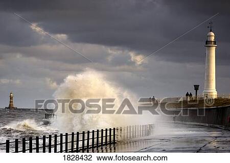 Waves crashing at lighthouse, Sunderland, Tyne and Wear, England View Large Photo Image Stock Image - Waves crashing at lighthouse, Sunderland, Tyne and Wear, England. Fotosearch