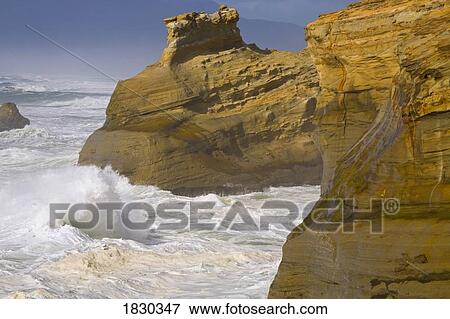 Stock Photo - Waves crashing, Cape Kiwanda, Oregon, USA. Fotosearch