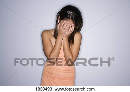 Woman covering face View Large Photo Image Stock Image - Woman covering face. Fotosearch