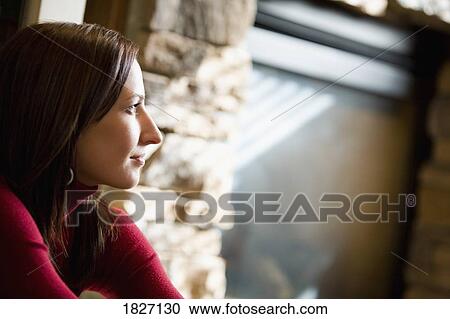 Woman deep in thought View Large Photo Image Stock Image - Woman deep in thought. Fotosearch