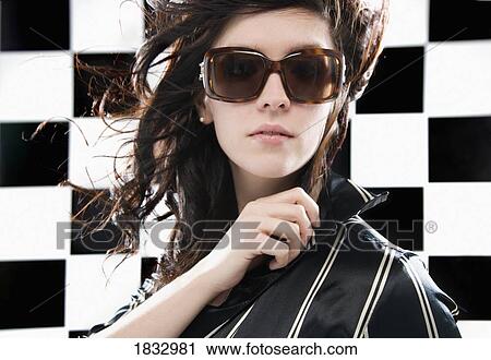 Stock Image - Woman in sunglasses. Fotosearch