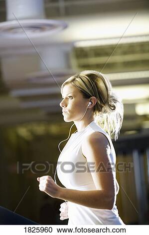 Woman running View Large Photo Image Stock Image - Woman running. Fotosearch