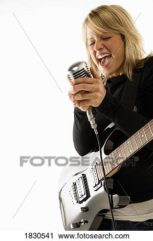 Stock Image - Woman singing. Fotosearch