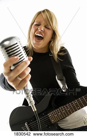 Stock Image - Woman singing. Fotosearch
