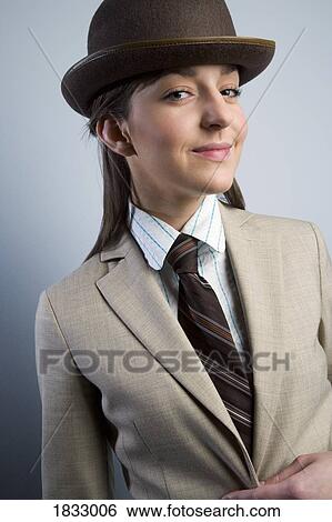 Woman wearing a suit View Large Photo Image Stock Photograph - Woman wearing a suit. Fotosearch