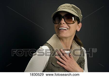 Woman with sunglasses View Large Photo Image Stock Photo - Woman with sunglasses. Fotosearch