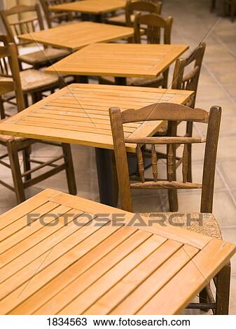 Wooden tables and chairs View Large Photo Image Stock Image - Wooden tables and chairs. Fotosearch