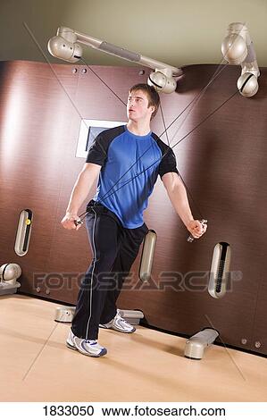 Stock Image - Working out at home. Fotosearch