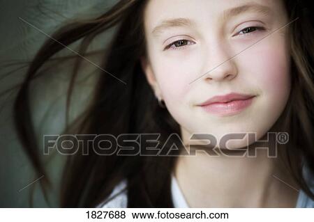 Young girl's face View Large Photo Image Stock Photo - Young girl's face. Fotosearch