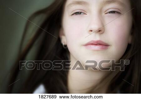 Stock Photo - Young girl's face. Fotosearch
