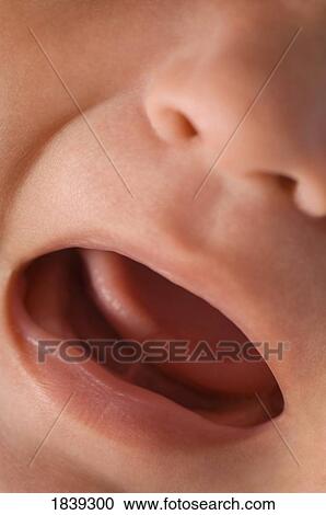 Stock Image - Baby crying. Fotosearch