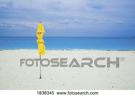 Beach umbrella, Treasure Cay, Abaco, Bahamas View Large Photo Image Stock Photography - Beach umbrella, Treasure Cay, Abaco, Bahamas. Fotosearch