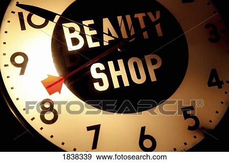 Beauty shop sign and clock View Large Photo Image Stock Photo - Beauty shop sign and clock. Fotosearch