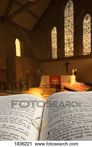 Stock Image - Bible in church sanctuary. Fotosearch