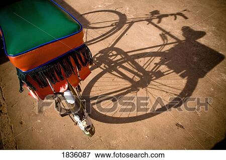 Stock Photo - Bicycle shadow, Gulu, Northern Uganda, Africa . Fotosearch
