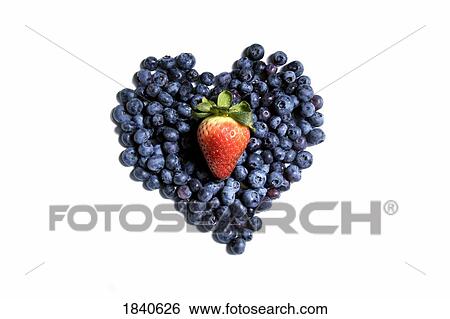 Blueberries and a strawberry shaped like a heart View Large Photo Image Stock Photograph - Blueberries and a strawberry shaped like a heart. Fotosearch