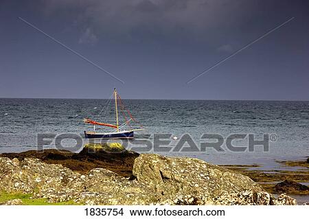 Picture - Boat in the water, Colonsay, Scotland. Fotosearch