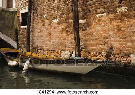 Boat moored in canal, Venice, Italy View Large Photo Image Picture - Boat moored in canal, Venice, Italy. Fotosearch