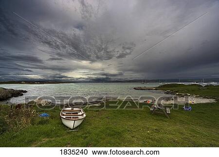 Boat on the shore View Large Photo Image Stock Image - Boat on the shore. Fotosearch