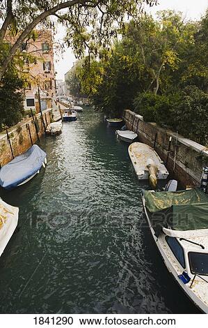 Boats in a canal, Venice, Italy View Large Photo Image Stock Image - Boats in a canal, Venice, Italy. Fotosearch