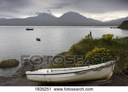 Boats on the water and on the shore View Large Photo Image Stock Image - Boats on the water and on the shore. Fotosearch