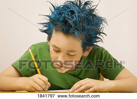 Stock Photo - Boy with blue spiked hair writing. Fotosearch