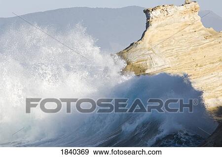 Breaking wave, Cape Kiwanda, Pacific City, Oregon, USA View Large Photo Image Stock Photo - Breaking wave, Cape Kiwanda, Pacific City, Oregon, USA. Fotosearch
