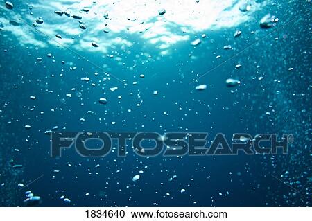 Stock Image - Bubbles underwater. Fotosearch