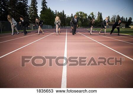 Business-people on a racetrack View Large Photo Image Stock Image - Business-people on a racetrack. Fotosearch