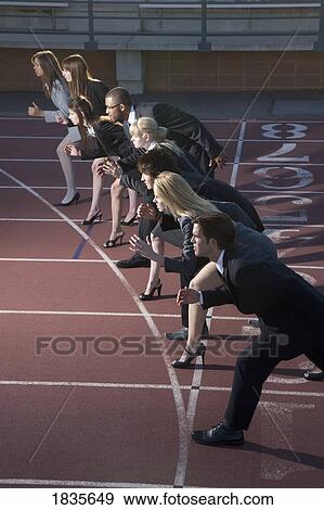 Stock Photo - Business people on a racetrack. Fotosearch