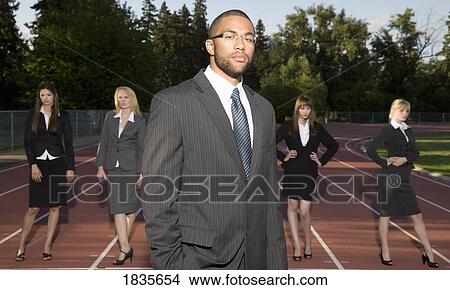 Businessman and businesswomen on a racetrack View Large Photo Image Picture - Businessman and businesswomen on a racetrack. Fotosearch