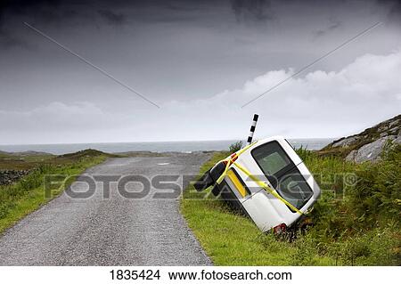 Picture - Car in the ditch. Fotosearch