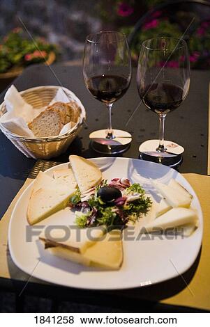 Cheese, bread and wine View Large Photo Image Stock Photo - Cheese, bread and wine. Fotosearch