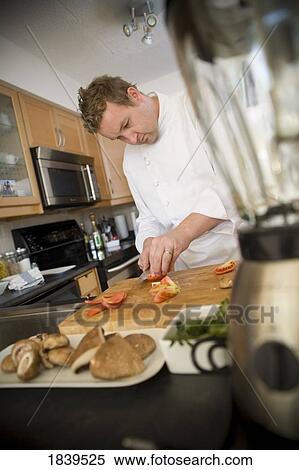Chef preparing food View Large Photo Image Stock Photography - Chef preparing food. Fotosearch