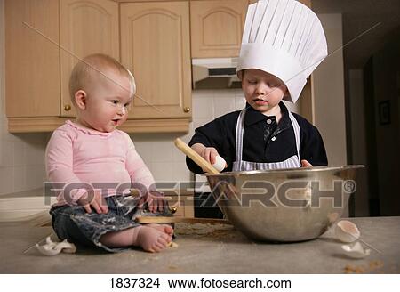 Children playing in the kitchen View Large Photo Image Picture - Children playing in the kitchen. Fotosearch