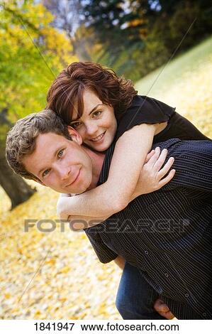 Stock Photo - Couple hugging. Fotosearch