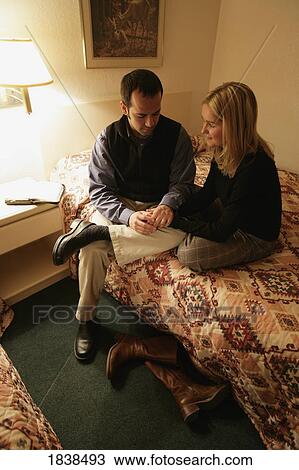 Couple praying together View Large Photo Image Stock Image - Couple praying together. Fotosearch