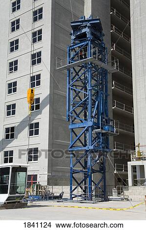 Picture - Crane assembly outside new hotel, Daytona Beach, Florida, USA . Fotosearch