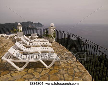 Picture - Deck chairs, Corfu, Greece . Fotosearch