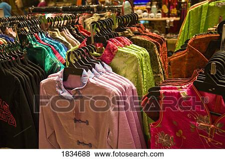 Dresses on racks, Central market, Kuala Lumpur, Malaysia Peninsula, Malaysia, Asia View Large Photo Image Stock Photo - Dresses on racks, Central market, Kuala Lumpur, Malaysia Peninsula, Malaysia, Asia. Fotosearch