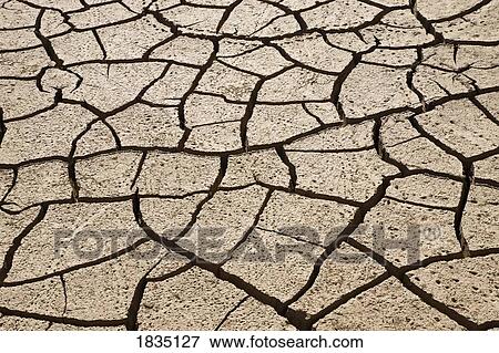 Dried river bed during drought View Large Photo Image Stock Photo - Dried river bed during drought . Fotosearch