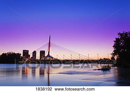 Stock Image - Esplanade Riel Bridge over the Red River, Winnipeg, Manitoba, Canada . Fotosearch