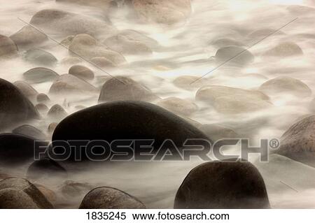 Fog rolling over rocks View Large Photo Image Stock Photography - Fog rolling over rocks. Fotosearch