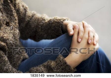 Stock Photo - Folded hands. Fotosearch