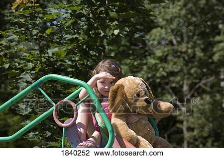 Stock Image - Girl at playground. Fotosearch