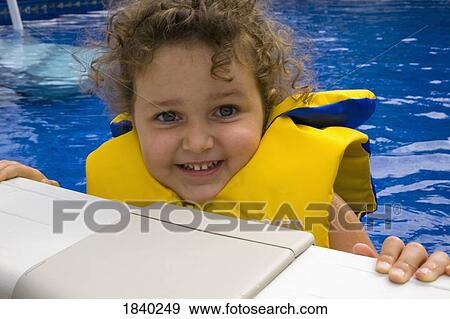 Stock Photo - Girl in a life vest. Fotosearch