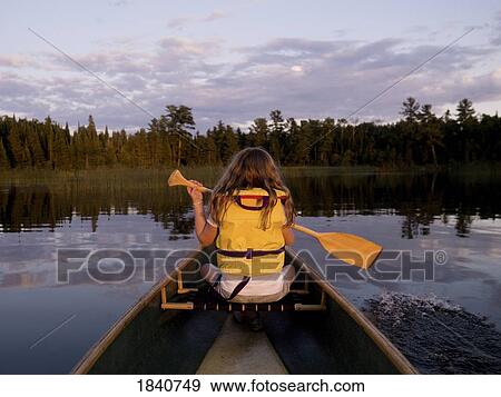Girl in canoe View Large Photo Image Stock Photo - Girl in canoe. Fotosearch